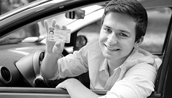 Driver Showing his Driver's Licenses